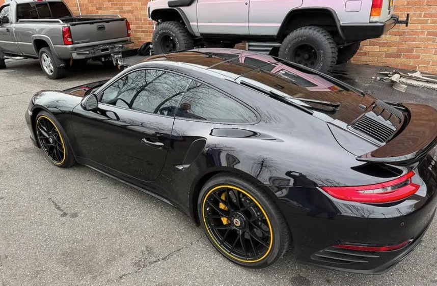 Black Porsche 911 Turbo with freshly installed window tint at NY Window Tinting