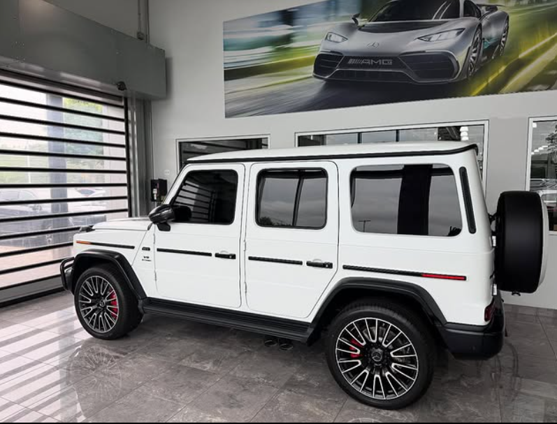 White Mercedes G-Wagon with tinted windows
